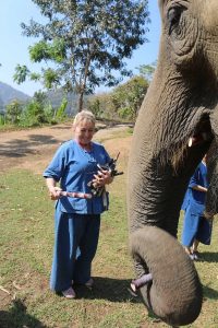 Lady Ashtar, Terrie Symons on her Thailand tour feeding an elephant